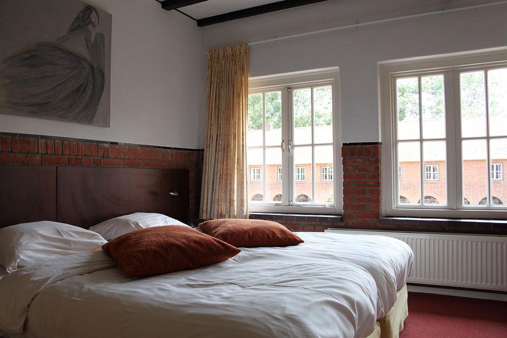 Hotel De Volksabdij Ossendrecht Ruang foto