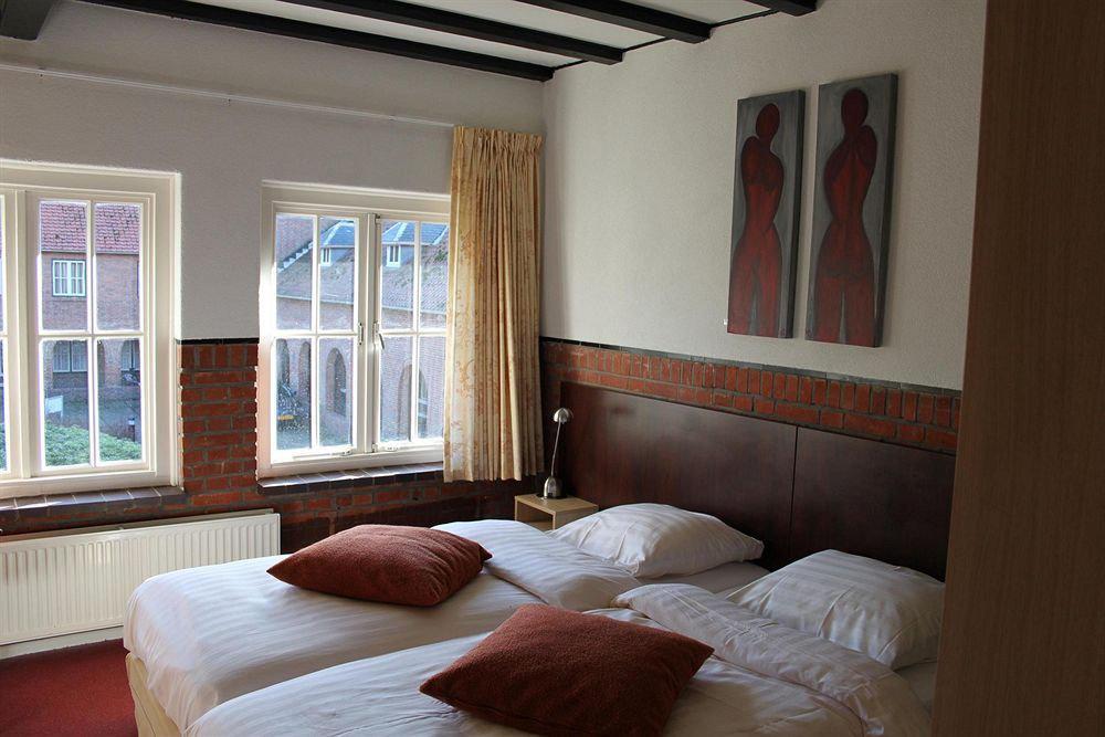 Hotel De Volksabdij Ossendrecht Bagian luar foto